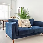 Decompress At A Tranquil, Minimal Urban Oasis With An Edge