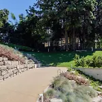 Boutique Rentals- Art & Charm Apt W/ Balcony & Garage